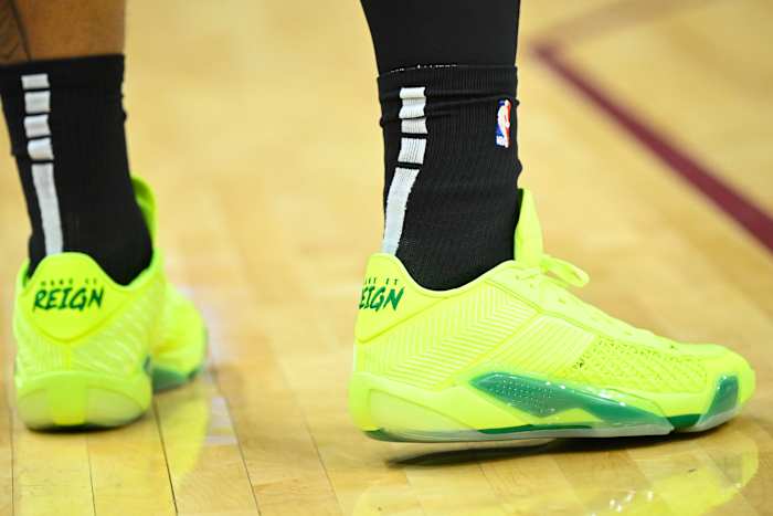 Orlando Magic forward Paolo Banchero's green Air Jordan sneakers.